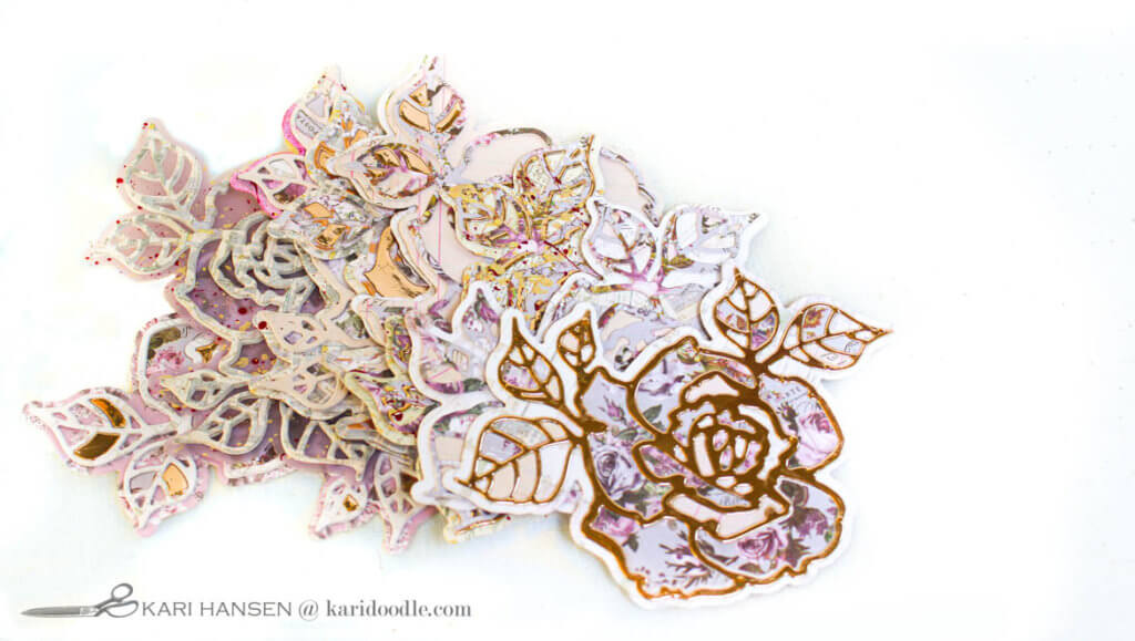 stack of inlaid rose die cuts